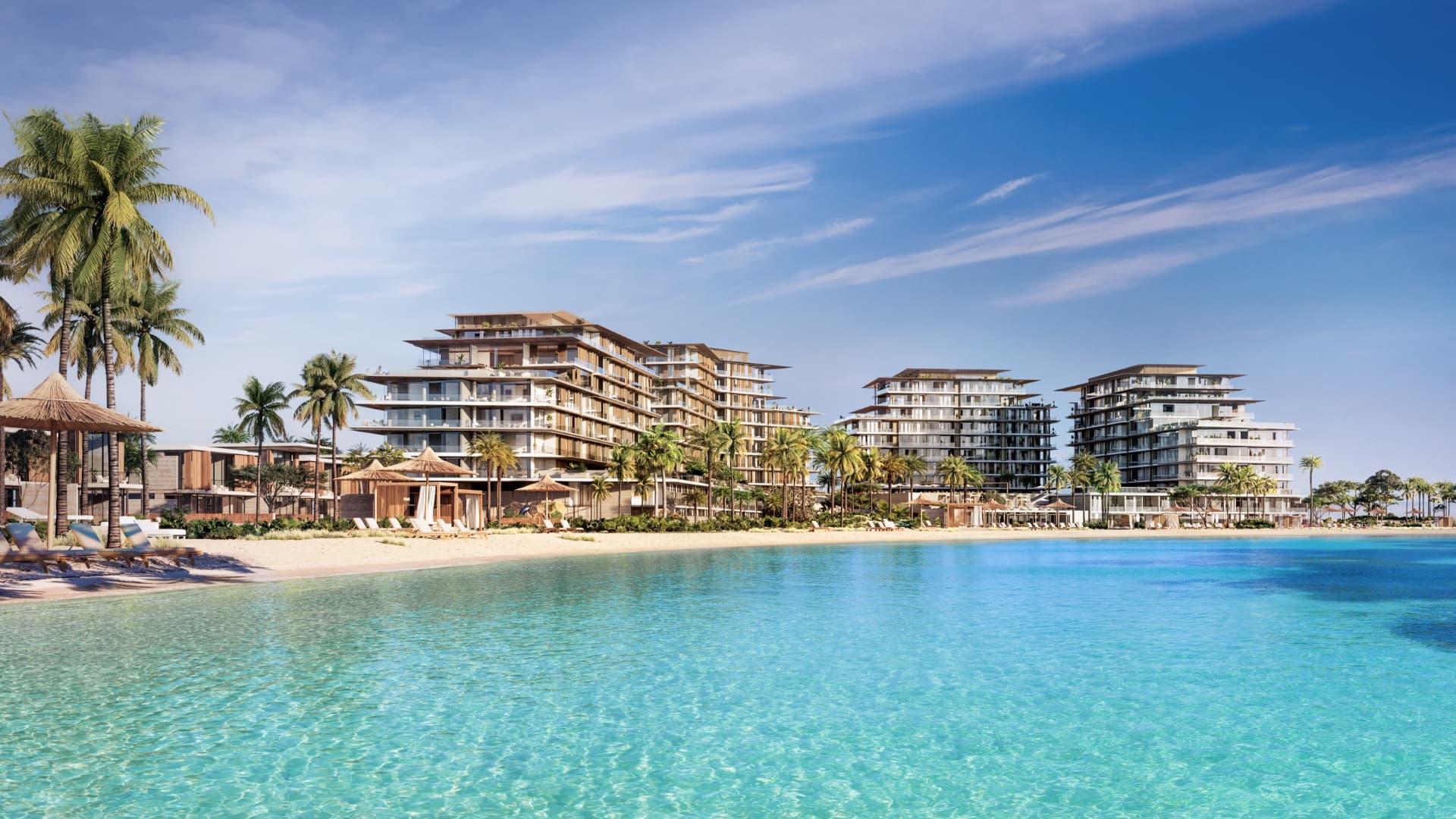 Rixos Hotel and Residences Dubai Islands render, terraced apartment buildings overlooking a private beach cove